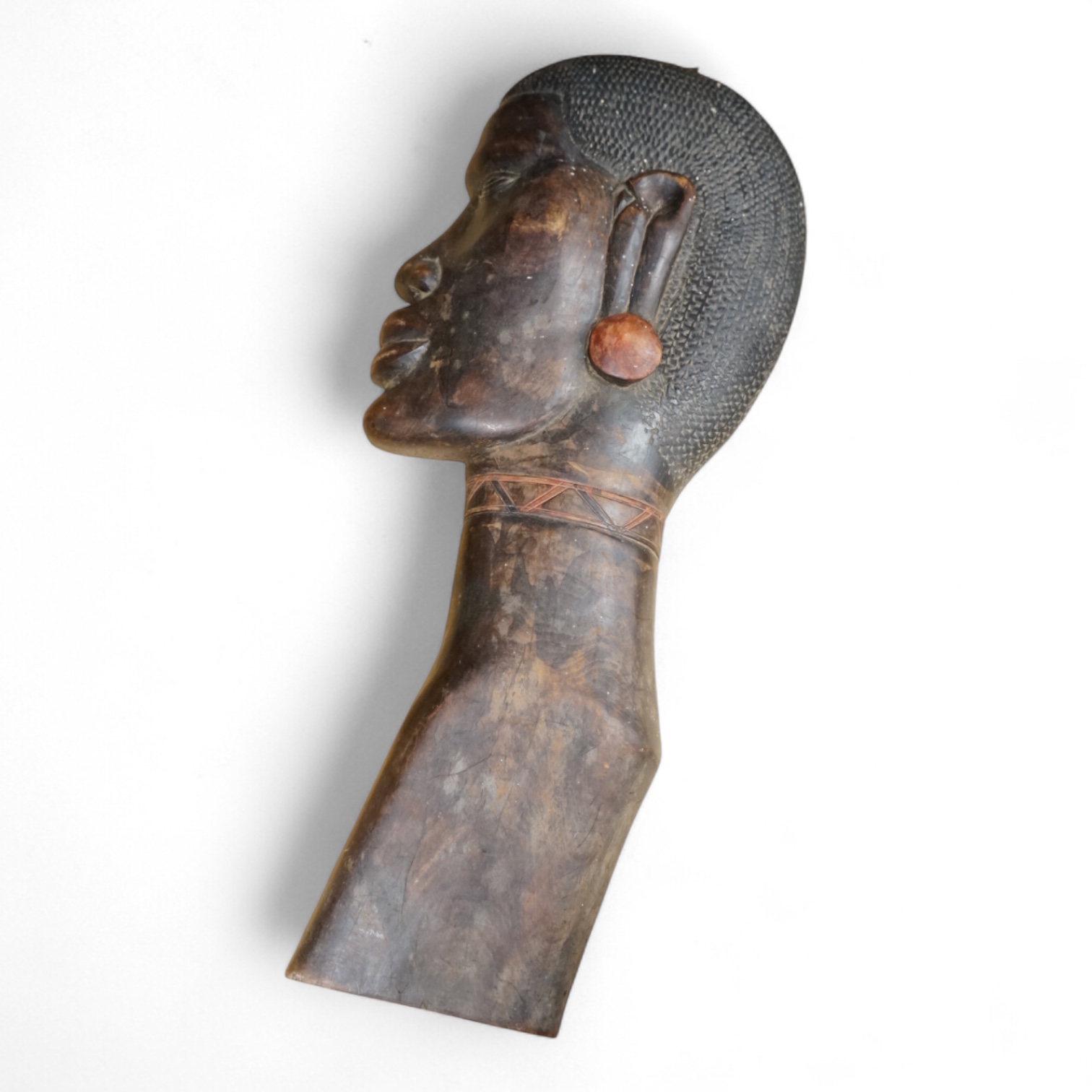 A carved African tribal hardwood wall plaque, 64cm high